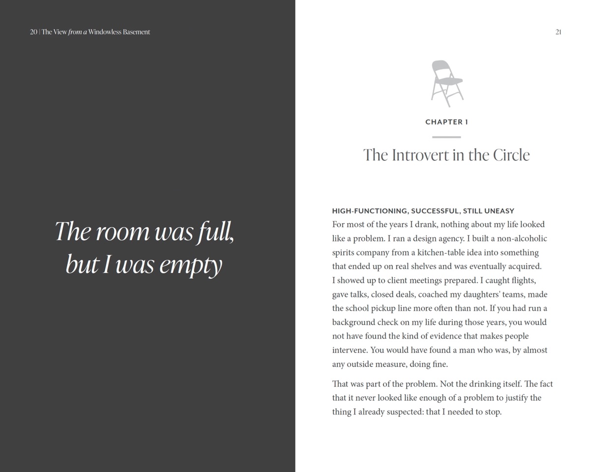 A two-page spread from inside The View from a Windowless Basement, opening Chapter 1: “The room was full, but I was empty.”